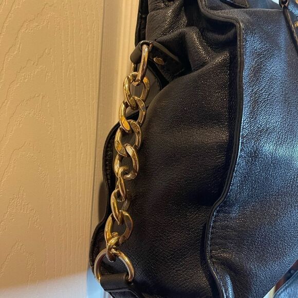 Michael Kors black leather large shoulder bag with gold tone accents. - Picture 11 of 14